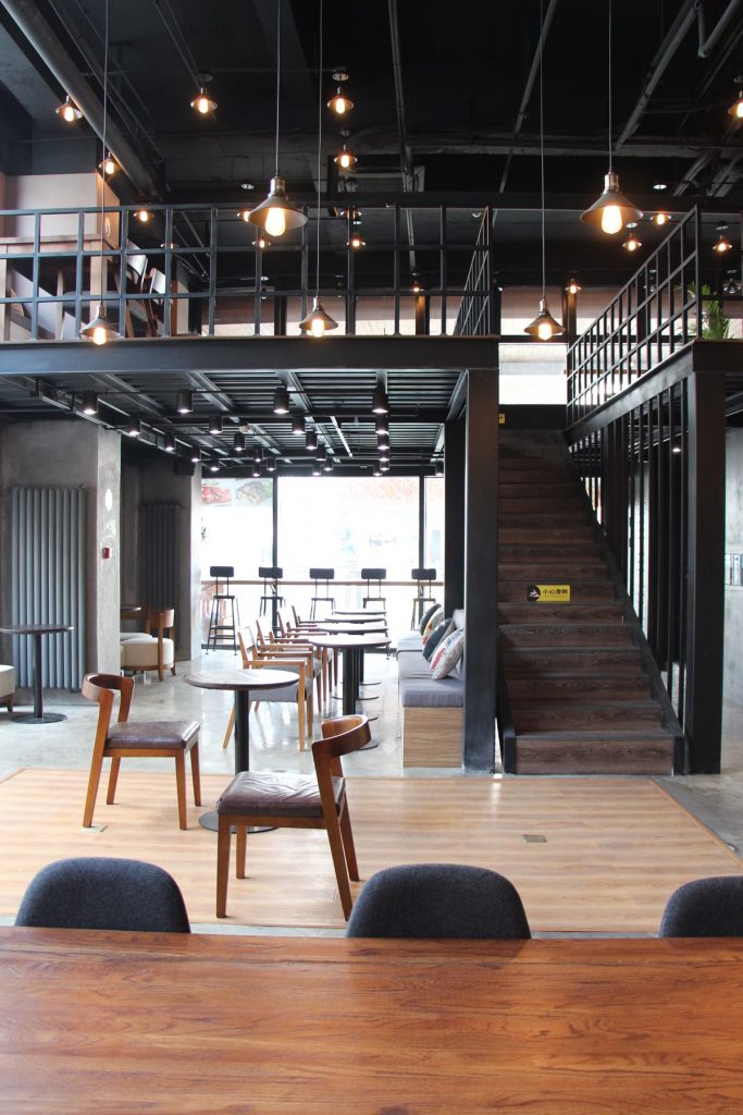 Mezzanine floor in BeanBar Cafe. Image shows how floor space is doubled without crowding customers. Inspiration picture to show how a mezzanine can be both practical and stylish.