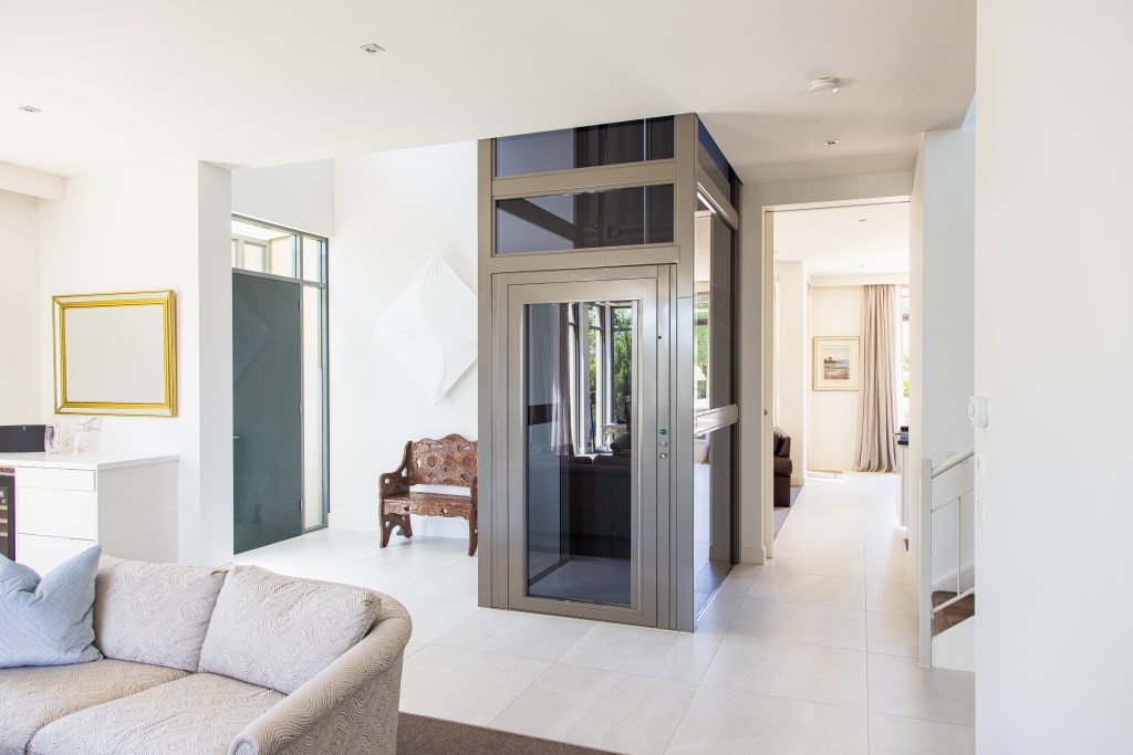 steel lift with grey colour with white interior surrounds