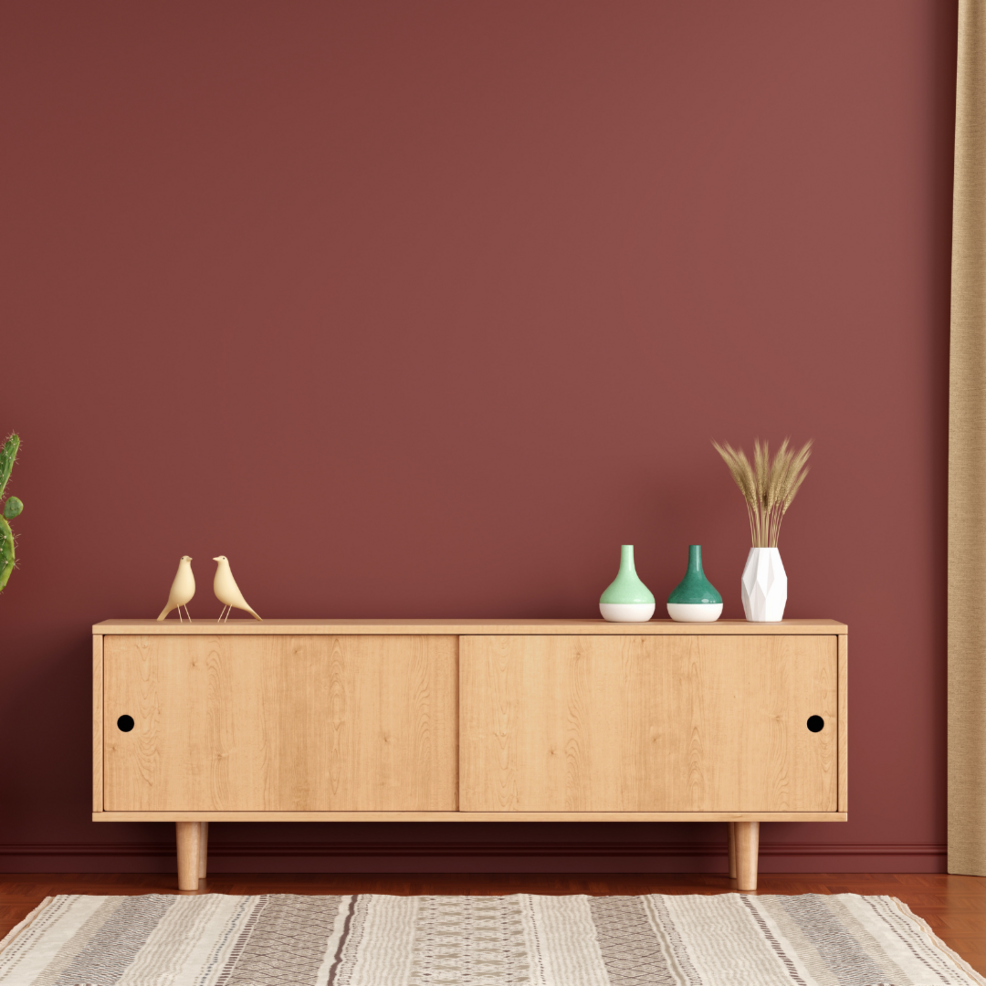 mid century modern furniture in front of a deep red wall