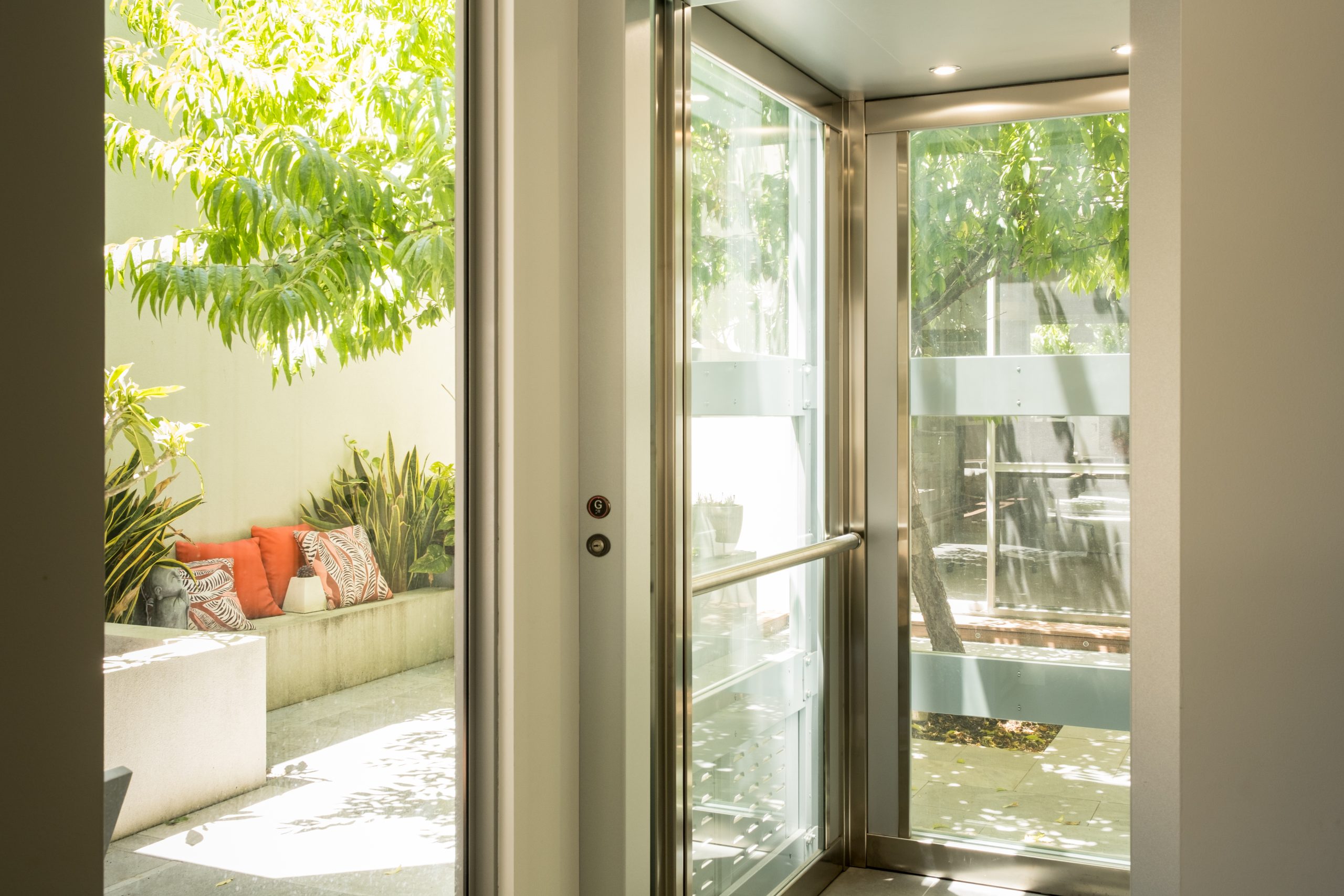 Home lift with garden view from window