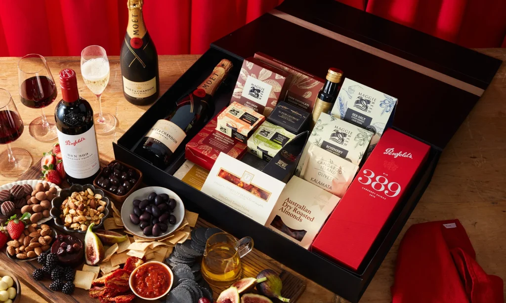 penfolds-hamper Luxury Penfolds gift hamper with wine, chocolates, and snacks.